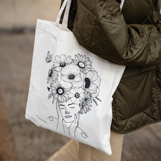 Canvas bag Embraced by butterfly wings