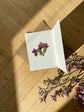 Greeting card with pressed cherry
